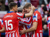 Players of Atletico de Madrid (from L to R) Clement Lenglet, Rodrigo De Paul, and Alexander Sorloth celebrate a goal during the La Liga EA S...