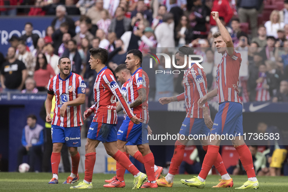 Alexander Sorloth of Atletico de Madrid celebrates a goal during the La Liga 2024/25 match between Atletico de Madrid and Las Palmas at Riya...