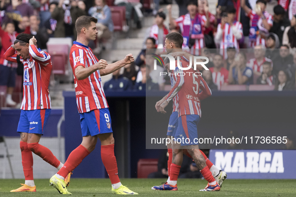 Alexander Sorloth of Atletico de Madrid celebrates a goal during the La Liga 2024/25 match between Atletico de Madrid and Las Palmas at Riya...