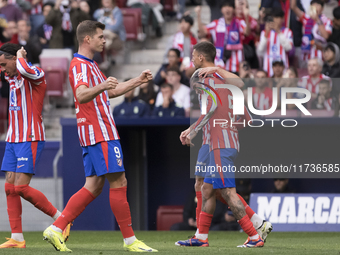 Alexander Sorloth of Atletico de Madrid celebrates a goal during the La Liga 2024/25 match between Atletico de Madrid and Las Palmas at Riya...