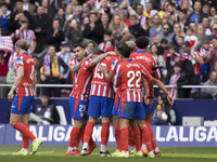 In Madrid, Spain, on November 3, several players of Atletico de Madrid celebrate a goal during the La Liga 2024/25 match between Atletico de...