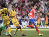 Alexander Sorloth of Atletico de Madrid celebrates a goal during the La Liga 2024/25 match between Atletico de Madrid and Las Palmas at Riya...