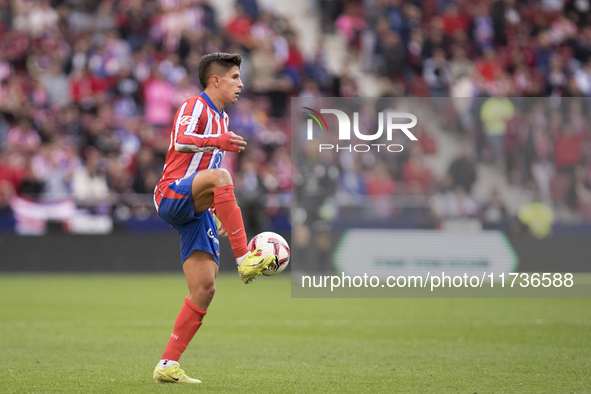 Giuliano Simeone of Atletico de Madrid controls the ball during the La Liga 2024/25 match between Atletico de Madrid and Las Palmas at Riyad...