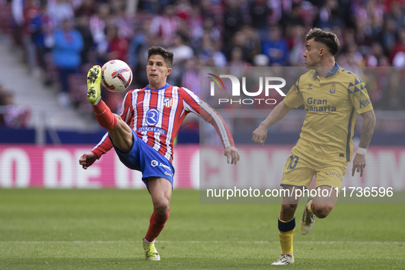 Giuliano Simeone of Atletico de Madrid controls the ball during the La Liga 2024/25 match between Atletico de Madrid and Las Palmas at Riyad...