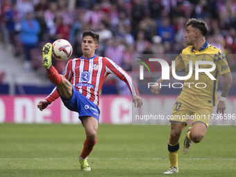 Giuliano Simeone of Atletico de Madrid controls the ball during the La Liga 2024/25 match between Atletico de Madrid and Las Palmas at Riyad...