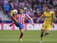 Giuliano Simeone of Atletico de Madrid controls the ball during the La Liga 2024/25 match between Atletico de Madrid and Las Palmas at Riyad...