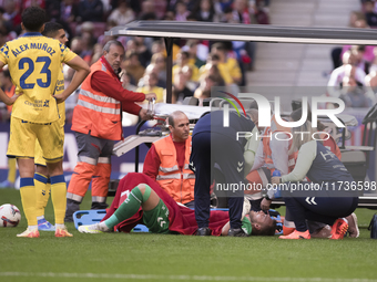 Jasper Cillessen of Las Palmas is injured during the La Liga 2024/25 match between Atletico de Madrid and Las Palmas at Riyadh Air Metropoli...