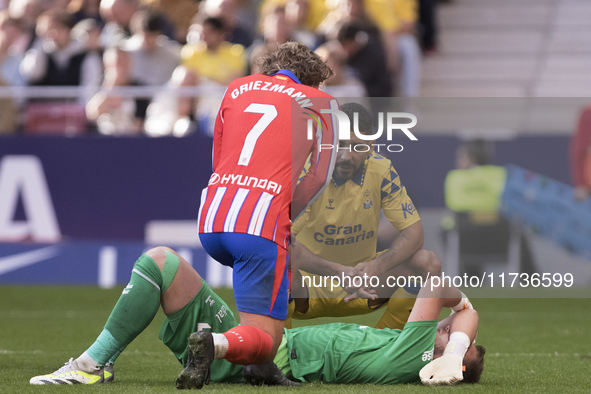 Jasper Cillessen of Las Palmas is injured during the La Liga 2024/25 match between Atletico de Madrid and Las Palmas at Riyadh Air Metropoli...