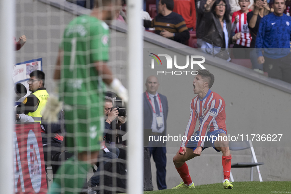 Giuliano Simeone of Atletico de Madrid celebrates a goal during the La Liga 2024/25 match between Atletico de Madrid and Las Palmas at Riyad...