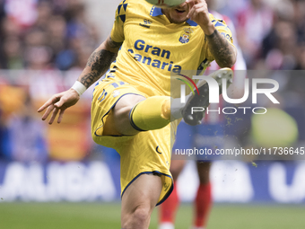 Viti Rozada of Las Palmas attempts a shot during the La Liga 2024/25 match between Atletico de Madrid and Las Palmas at Riyadh Air Metropoli...