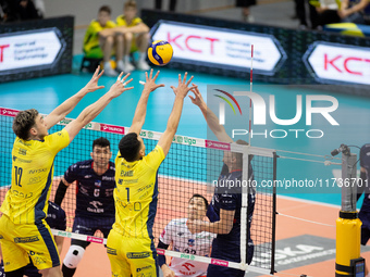 Nicolas Zerba, Zouheir El Graoui, and Rafal Szymura participate in a PLUS Liga match between Stal Nysa and ZAKSA Kedzierzyn Kozle in Nysa, P...