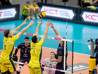 Nicolas Zerba, Zouheir El Graoui, and Rafal Szymura participate in a PLUS Liga match between Stal Nysa and ZAKSA Kedzierzyn Kozle in Nysa, P...