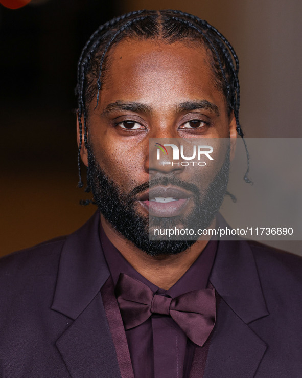 John David Washington wearing Gucci arrives at the 13th Annual LACMA Art + Film Gala 2024 presented by Gucci held at the Los Angeles County...