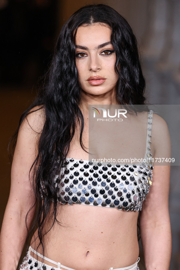 Charli XCX wearing Gucci arrives at the 13th Annual LACMA Art + Film Gala 2024 presented by Gucci held at the Los Angeles County Museum of A...