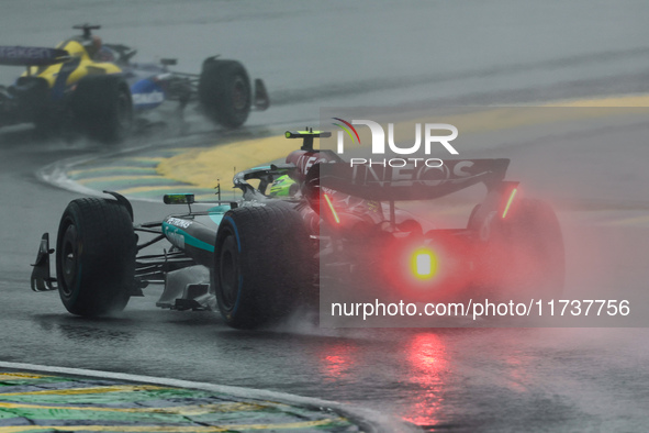 Lewis Hamilton of the UK drives the (44) Mercedes-AMG Petronas F1 Team F1 W15 E Performance Mercedes during the Formula 1 Lenovo Grande Prem...