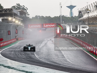 George Russell of the UK drives the (63) Mercedes-AMG Petronas F1 Team F1 W15 E Performance Mercedes during the Formula 1 Lenovo Grande Prem...