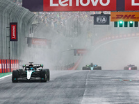 George Russell of the UK drives the (63) Mercedes-AMG Petronas F1 Team F1 W15 E Performance Mercedes during the Formula 1 Lenovo Grande Prem...