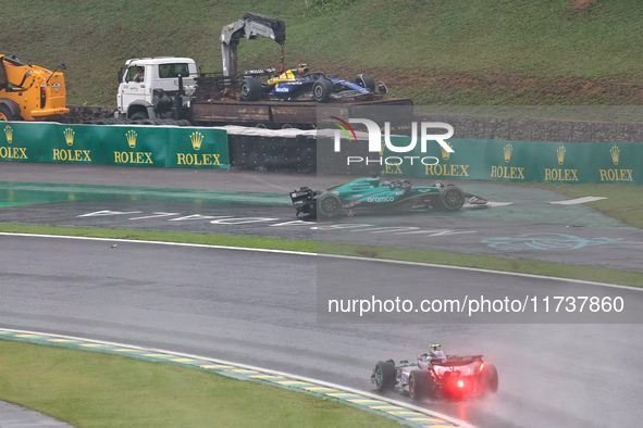 Lance Stroll of Canada drives the (18) Aston Martin Aramco Cognizant F1 Team AMR24 Mercedes and crashes during the Formula 1 Lenovo Grande P...