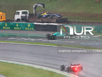 Lance Stroll of Canada drives the (18) Aston Martin Aramco Cognizant F1 Team AMR24 Mercedes and crashes during the Formula 1 Lenovo Grande P...