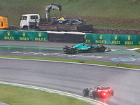 Lance Stroll of Canada drives the (18) Aston Martin Aramco Cognizant F1 Team AMR24 Mercedes and crashes during the Formula 1 Lenovo Grande P...