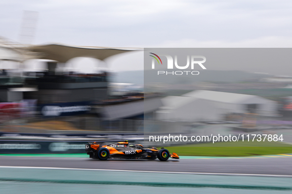 Lando Norris and Yuki Tsunoda participate in the Formula 1 Lenovo Grande Premio De Sao Paulo 2024 in Sao Paulo, Brazil, on November 3, 2024....