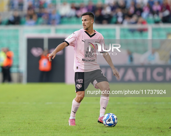 Valerio Verre of Palermo FC is in action during the Serie B match between Palermo and Cittadella at the Stadio ''Renzo Barbera'' in Palermo,...