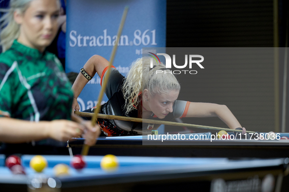 A female player from the Gibraltar Pool Association ladies national team performs during one of the events at the inaugural IBF World Blackb...