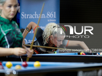 A female player from the Gibraltar Pool Association ladies national team performs during one of the events at the inaugural IBF World Blackb...