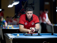 Lorna Micallef from the Malta Blackball ladies national team prepares the rack of balls before one of the events at the inaugural IBF World...