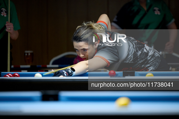 Jennifer Rumbado from the Gibraltar Pool Association ladies national team performs during one of the events at the inaugural IBF World Black...