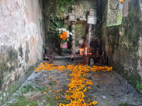 A grave is decorated with marigold flowers at Cemetery del Carmen, in the community of San Miguel Tzinacapan, during the Mexican Day of the...