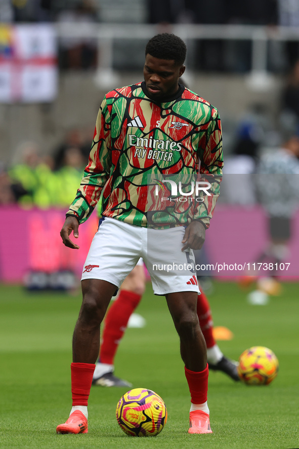 Thomas Partey of Arsenal warms up during the Premier League match between Newcastle United and Arsenal at St. James's Park in Newcastle, Uni...