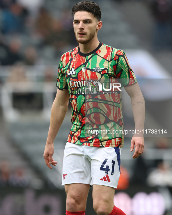 Declan Rice warms up during the Premier League match between Newcastle United and Arsenal at St. James's Park in Newcastle, United Kingdom,...