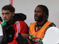 Raheem Sterling of Arsenal sits on the bench during the Premier League match between Newcastle United and Arsenal at St. James's Park in New...