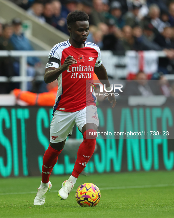 Bukayo Saka of Arsenal is in action during the Premier League match between Newcastle United and Arsenal at St. James's Park in Newcastle, U...