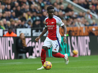 Bukayo Saka of Arsenal is in action during the Premier League match between Newcastle United and Arsenal at St. James's Park in Newcastle, U...