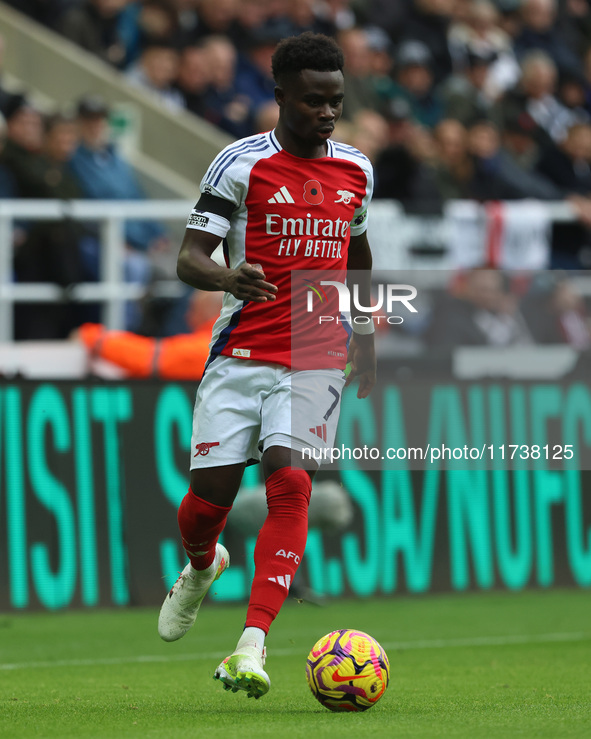 Bukayo Saka of Arsenal is in action during the Premier League match between Newcastle United and Arsenal at St. James's Park in Newcastle, U...