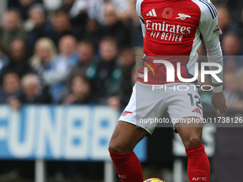 Jurrien Timber of Arsenal is in action during the Premier League match between Newcastle United and Arsenal at St. James's Park in Newcastle...