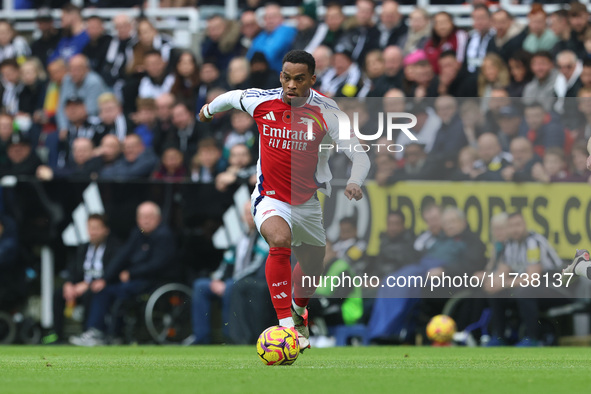 Arsenal's Jurrien Timber is in action during the Premier League match between Newcastle United and Arsenal at St. James's Park in Newcastle,...