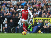 Arsenal's Jurrien Timber is in action during the Premier League match between Newcastle United and Arsenal at St. James's Park in Newcastle,...