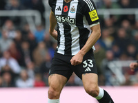 Dan Burn of Newcastle United plays during the Premier League match between Newcastle United and Arsenal at St. James's Park in Newcastle, Un...