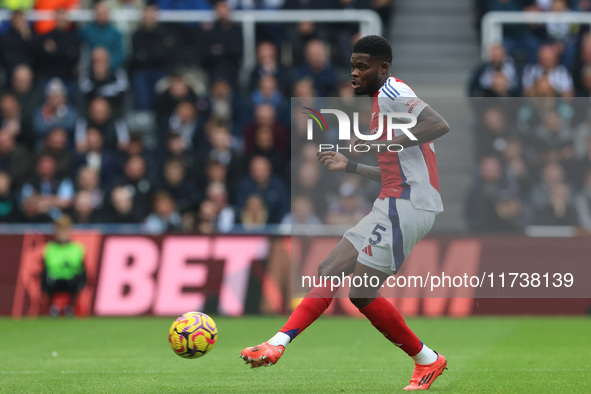 Thomas Partey plays during the Premier League match between Newcastle United and Arsenal at St. James's Park in Newcastle, United Kingdom, o...