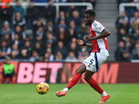 Thomas Partey plays during the Premier League match between Newcastle United and Arsenal at St. James's Park in Newcastle, United Kingdom, o...