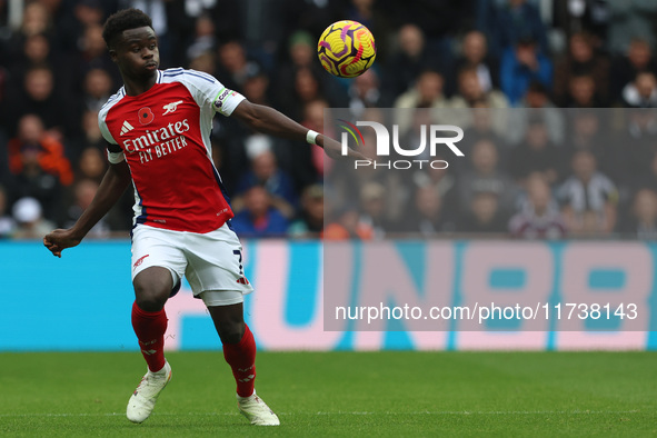 Bukayo Saka plays during the Premier League match between Newcastle United and Arsenal at St. James's Park in Newcastle, United Kingdom, on...