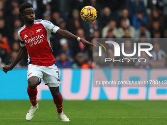 Bukayo Saka plays during the Premier League match between Newcastle United and Arsenal at St. James's Park in Newcastle, United Kingdom, on...