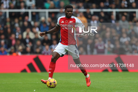 Thomas Partey plays during the Premier League match between Newcastle United and Arsenal at St. James's Park in Newcastle, United Kingdom, o...