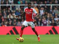 Thomas Partey plays during the Premier League match between Newcastle United and Arsenal at St. James's Park in Newcastle, United Kingdom, o...