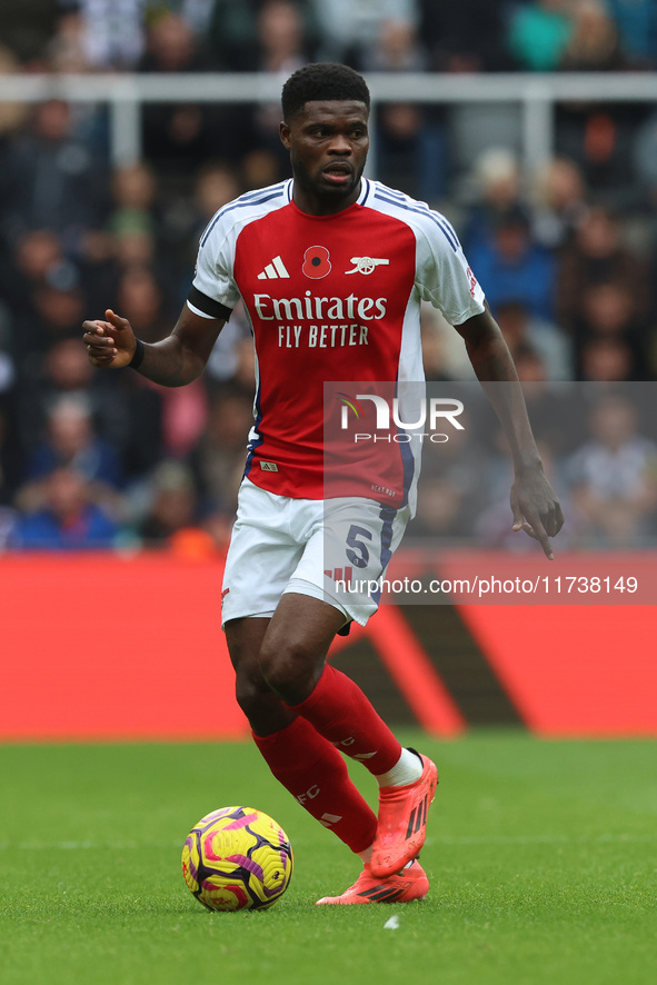 Thomas Partey plays during the Premier League match between Newcastle United and Arsenal at St. James's Park in Newcastle, United Kingdom, o...