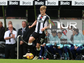 Lewis Hall of Newcastle United plays during the Premier League match between Newcastle United and Arsenal at St. James's Park in Newcastle,...