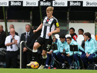 Lewis Hall of Newcastle United plays during the Premier League match between Newcastle United and Arsenal at St. James's Park in Newcastle,...